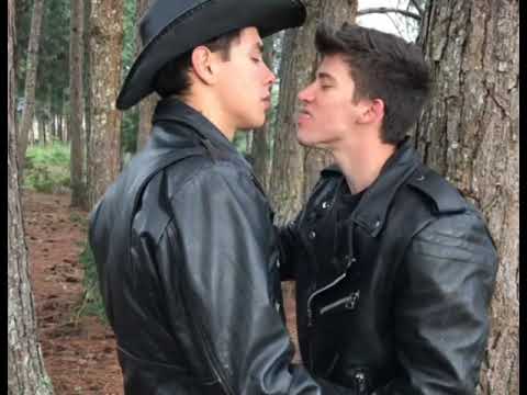 Sexy guys kissing in leather